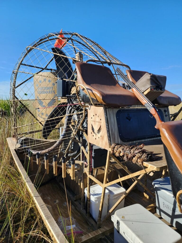 Decoys and blind gear loaded on a camo airboat