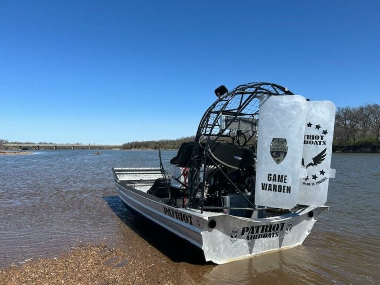A Texas Game Warden Patriot on the shoreline