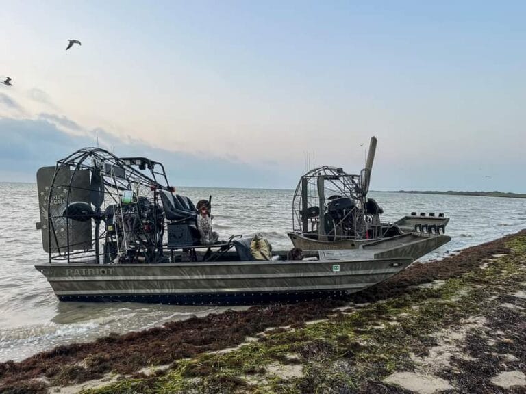 Camo Patriots pulled up on the shoreline