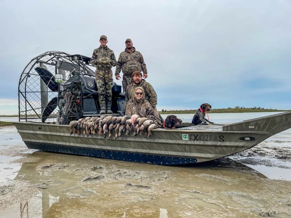 Four duck hunters, a dog and a morning of ducks on a Patriot hunting airboat