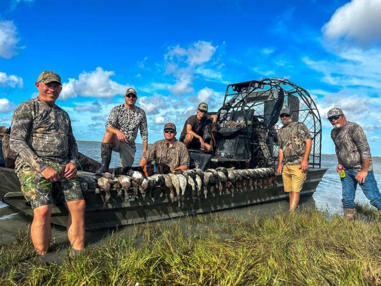 A duck hunting crew with the limit on the bow
