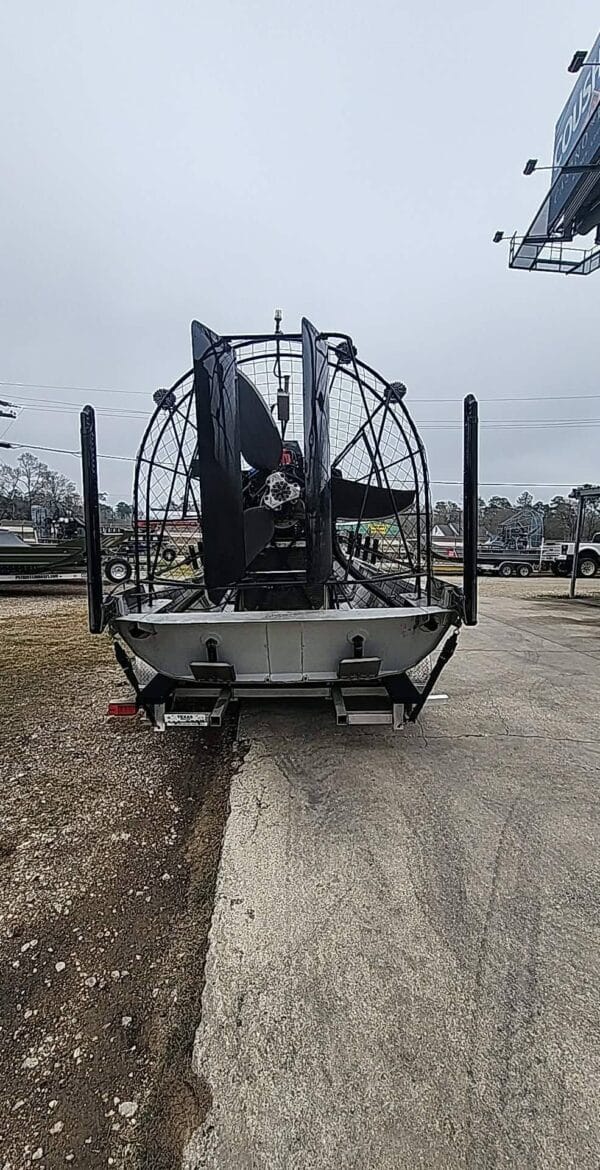 Airboat engine, prop and rudders, seen from behind