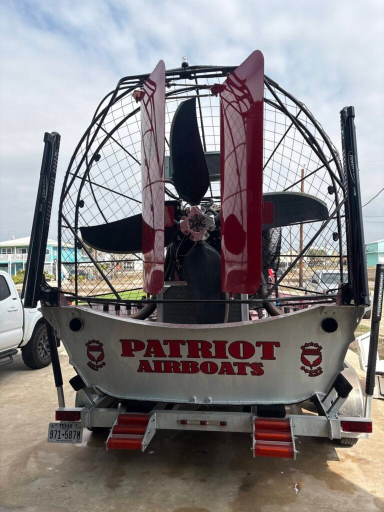 Red rudders and the Patriot name on the cage