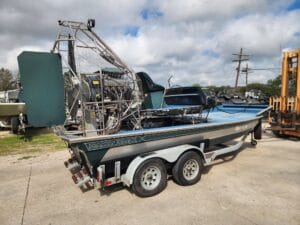 2019 Diamondback airboat rear quarter view, stainless cage and hull lettering