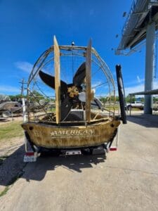 2019 AirRanger airboat from the stern, prop, rudders and American Airboats transom badge