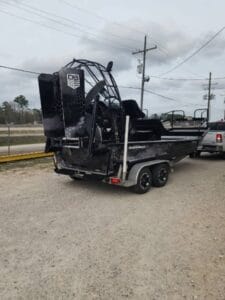 2008 Diamondback airboat rear quarter view, cage and DB-badged rudders