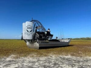 2023 Patriot airboat sitting on a marsh grass flat
