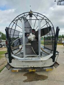 1992 custom airboat from the stern, four-blade prop inside the cage