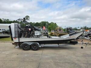 1992 custom 18x8 airboat on a tandem trailer, side view