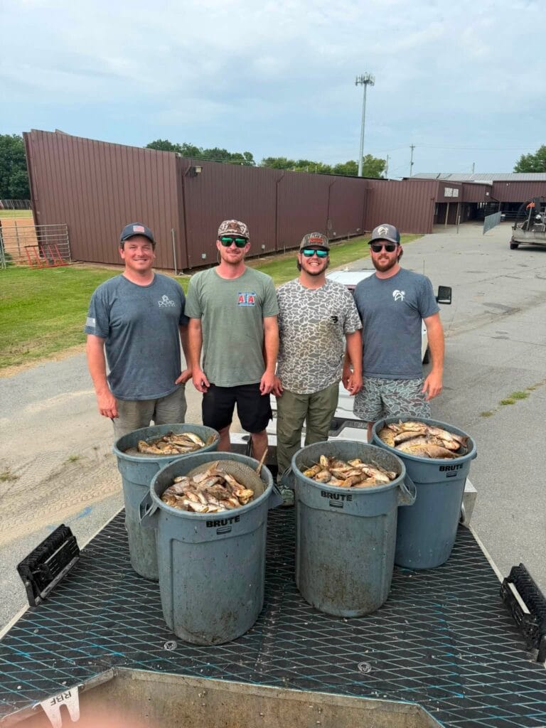 Carp in bins after an Arkansas bowfishing tournament