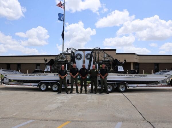 Calcasieu Parish Sheriff's Office deputies with two Patriot marine enforcement airboats